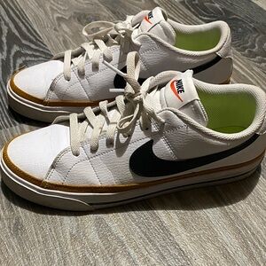 Nike White Sneakers with Gold and Black Accents